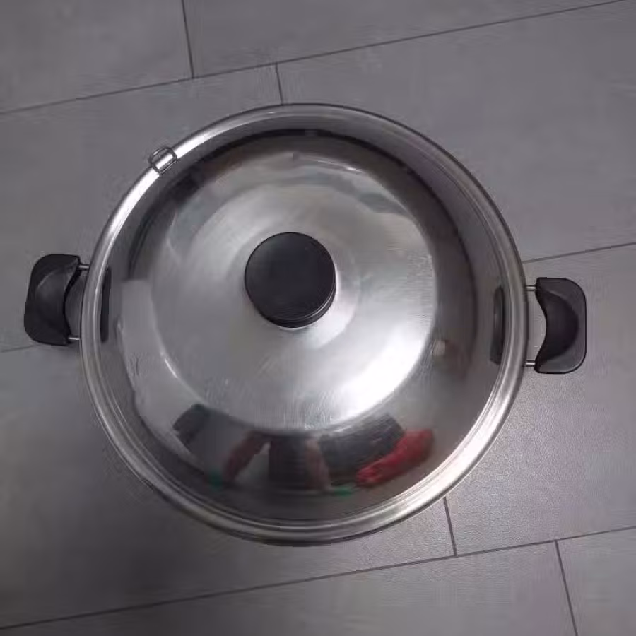 不锈钢炒锅。 图片 1