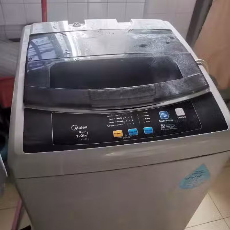控制面板有问题的洗衣机 图片 1